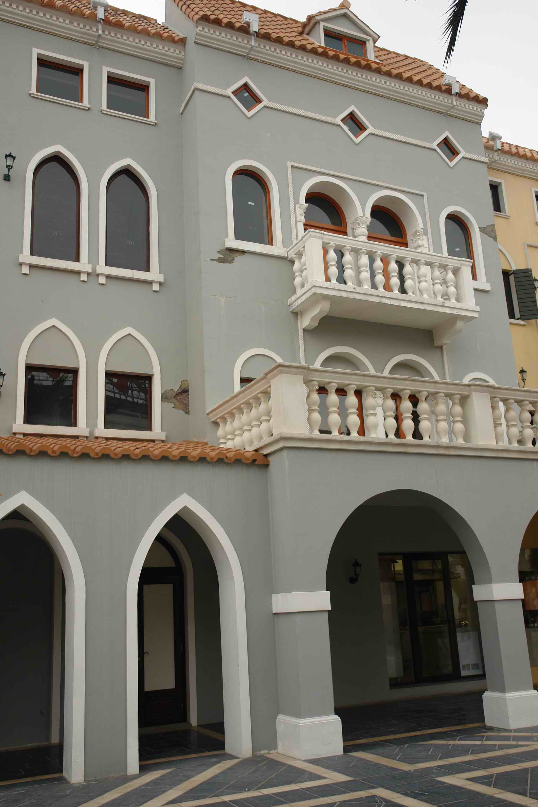 Notice the peeling facade?  It only opened a few months ago