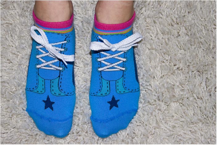 <b>8th </b><br> Socks or Shoes?<br> by Ismar dos Santos