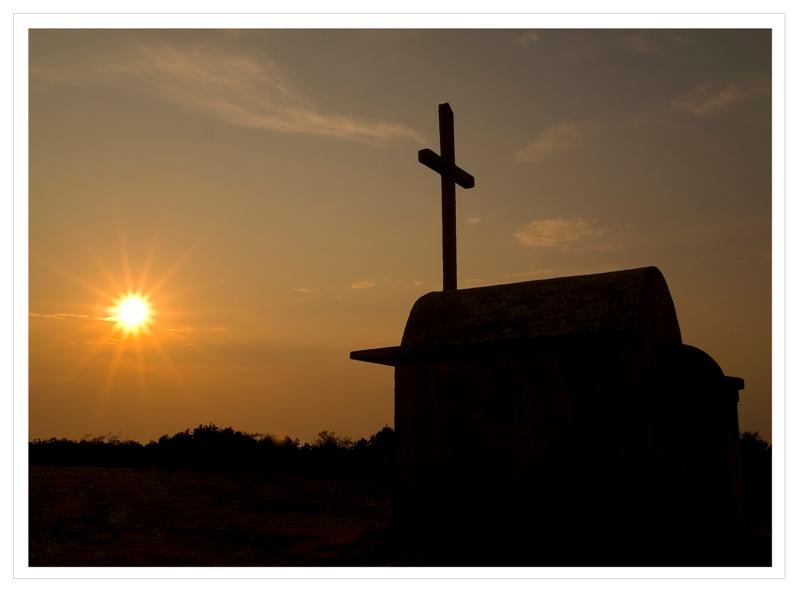Sunset over the chapel above San Stefanos