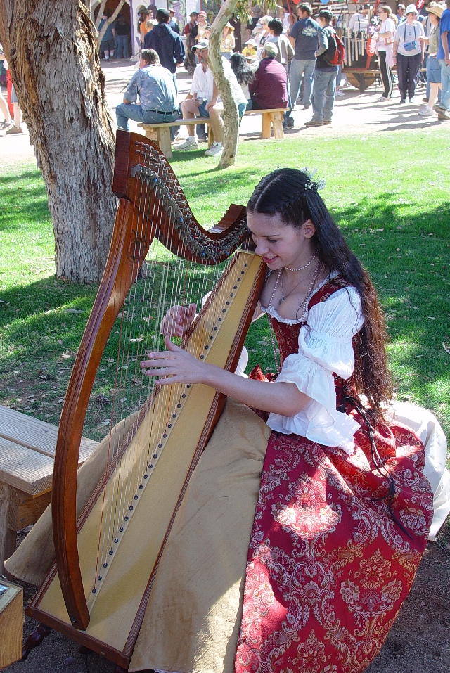 A BUSTY HARP PLAYER