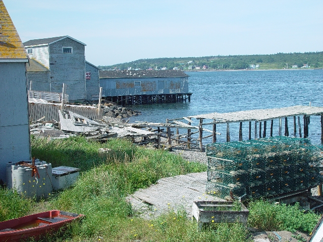 AN ABANDONED FISH FACTORY ON THE WAY-NOTICE THE LOBSTER TRAPS ALL IN A ROW