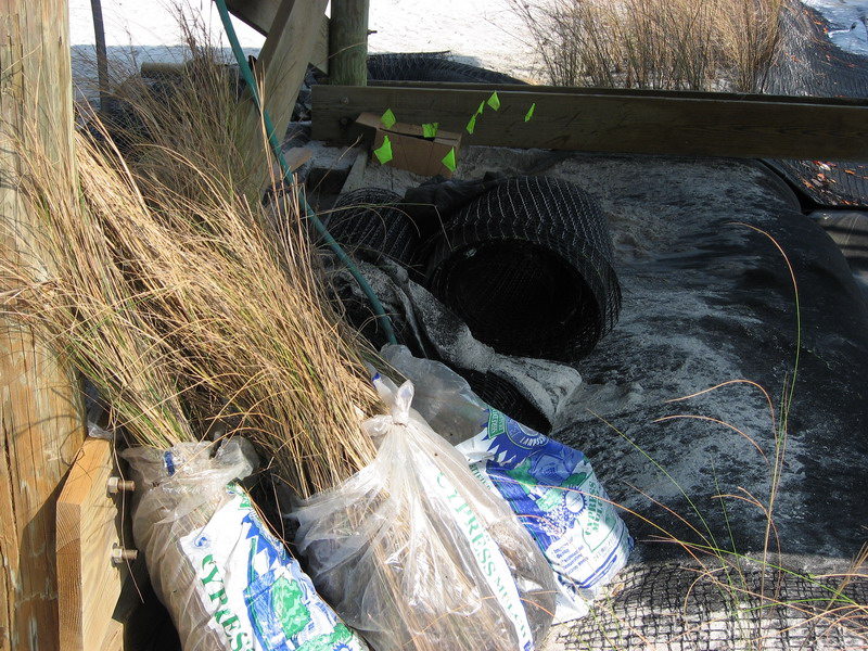 bags of grasses left under gazebo