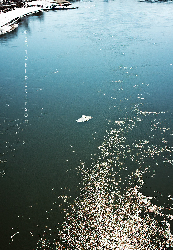 Ice floating away, sun glittering off the water and the warmth from the sun are all signs that spring is coming