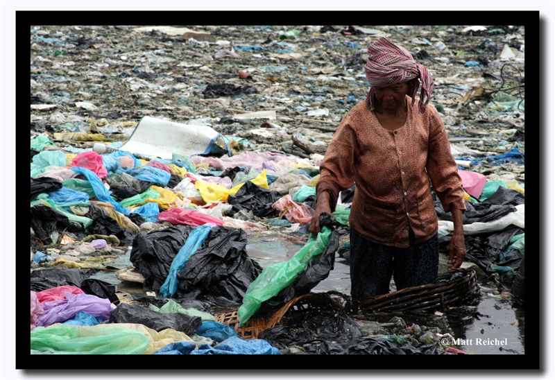 Old Woman Wading in Fetid Water, Steung Mean Chey, Cambodia.jpg