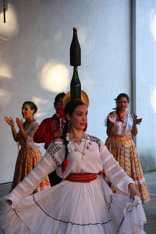 Dancer with two bottles