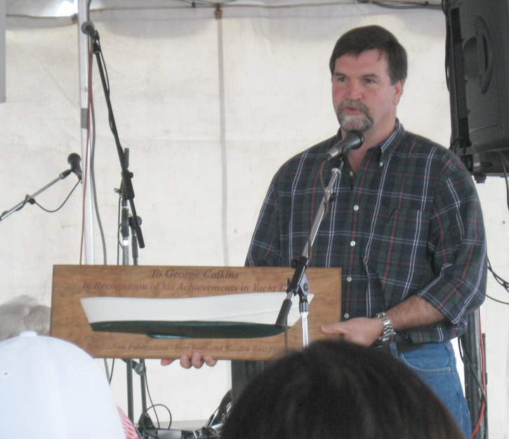 Devlin presenting half model of a 22 ft Bartender hull to George.