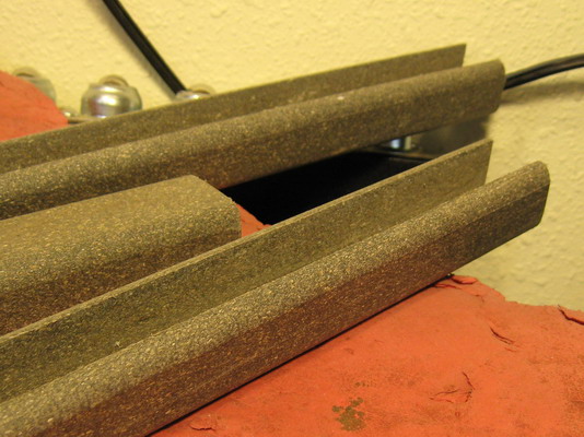 Trex extrusion milled on table saw, planer and shaper, about 5/4 by 4/4; kerfing needed to make bends.