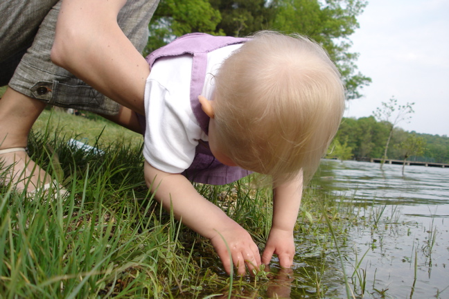 Touching the water of Tirana Lake