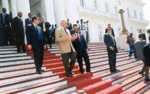 Former President Bill Clinton  leaving the National Palace