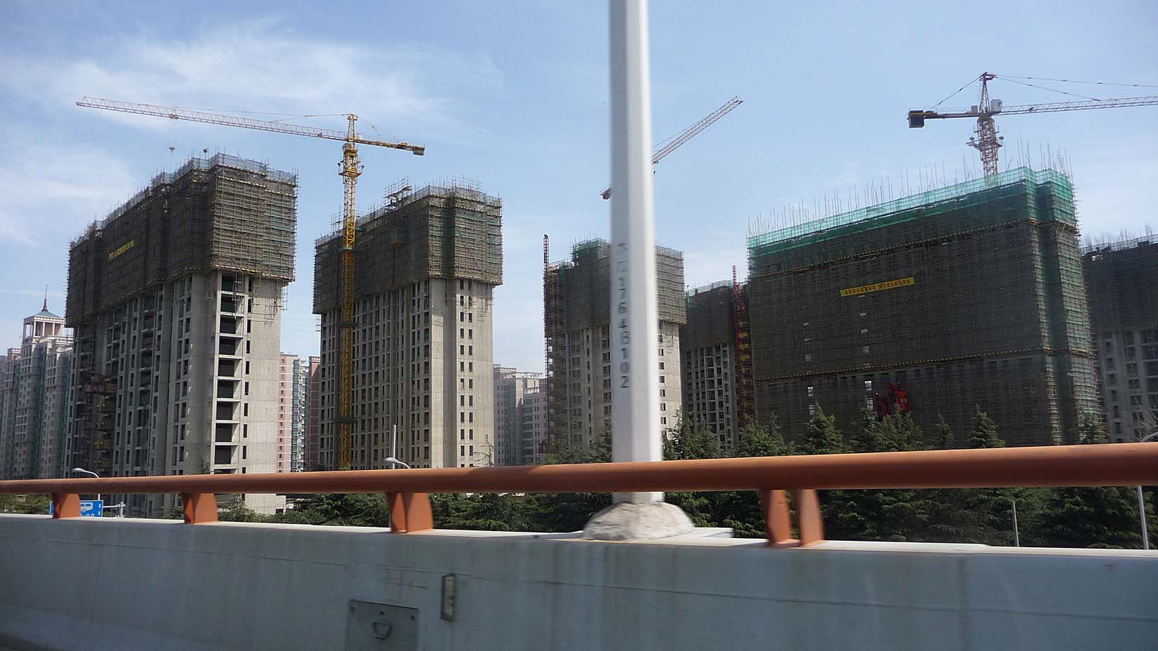 Some of the many cranes and new buildings being built in Shanghai.  The economy and construction industry is booming there!
