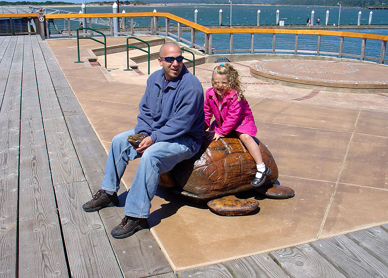 Hope and Uncle AJ riding the Sea Turtle