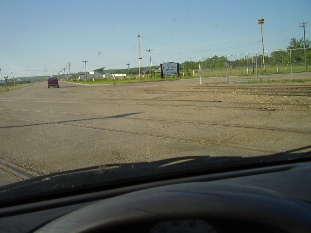 Heading north from Bottineau.... crossing FIVE sets of railroad tracks... impressive!  This is no One-Track-Town here!