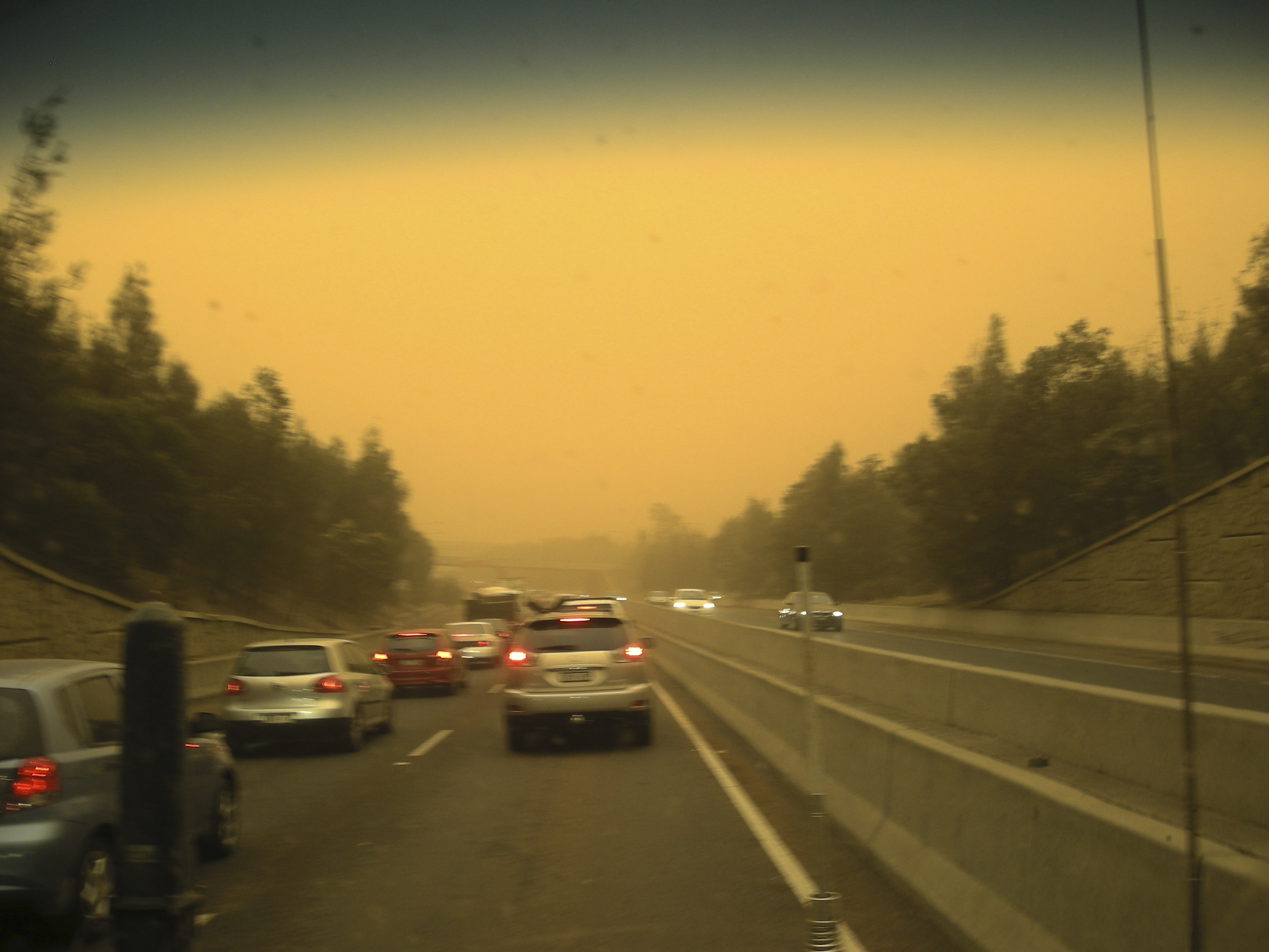 TRAFFIC SLOWS TO A CRAWL IN  REDUCED VISIBILITY DUE TO THE DUST STORM