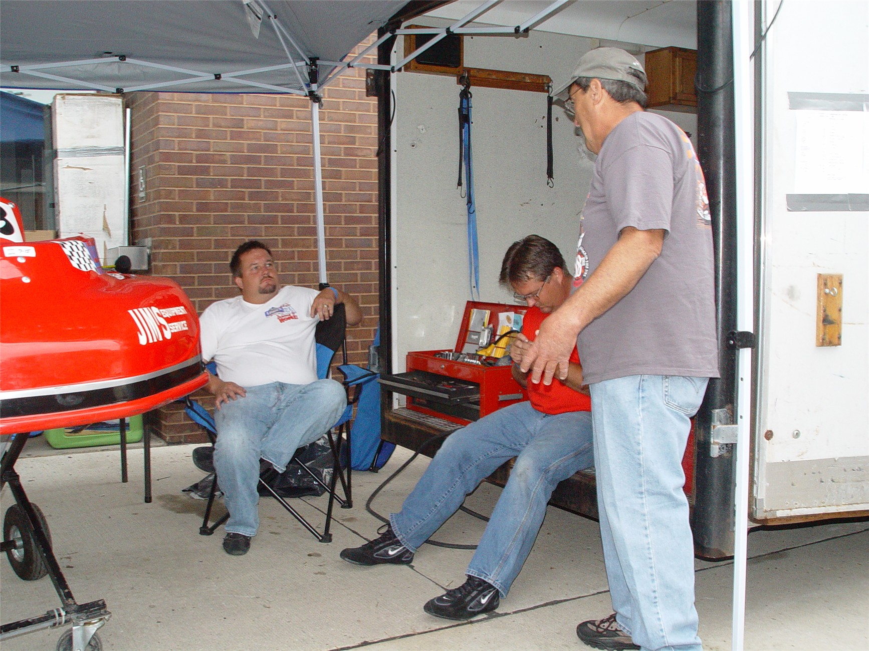 DAD RON SMITH COACHES  KLINT ON THE LEFT AND KYLE BEFORE THE RACES, RON AND I RACED EACH OTHER BACK IN THE LATE 60S