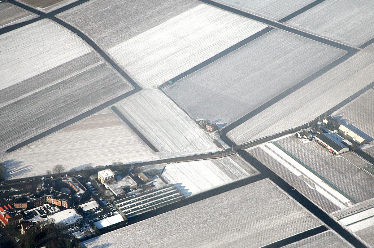 Dutch fields lightly covered by snow 8108