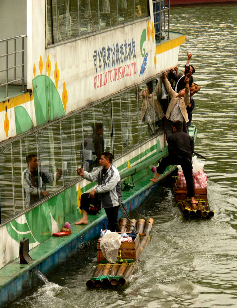 Moving marketplace,  Li River, Guilin, China, 2006