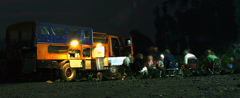 Eating dinner by the truck, Catholic Missionary, Ruhengeri, Rwanda.