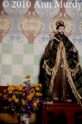 Saint with marigolds