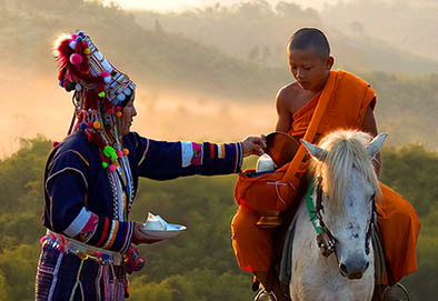 Bhudist Monk on Horse at Cheing Rai Thailand