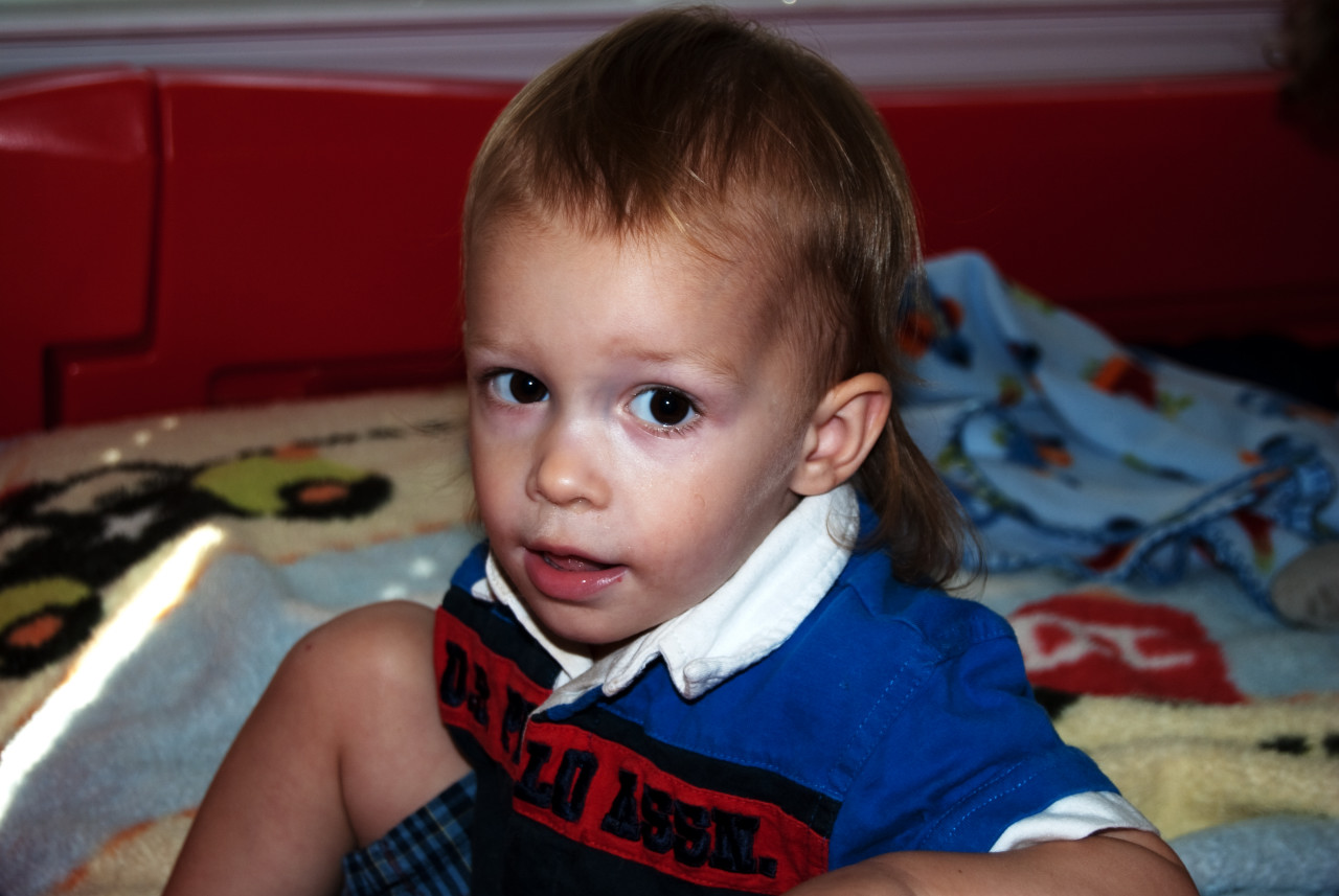 Gavin likes the new race car bed too DSC_3973.JPG