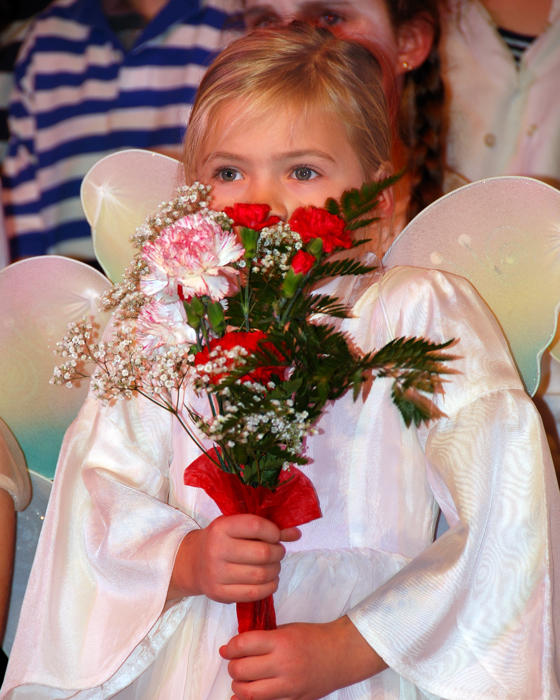 A sugarplum fairy with flowers from Daddy