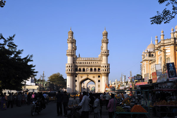 Busy streets radiate in the four cardinal directions from the Charminar