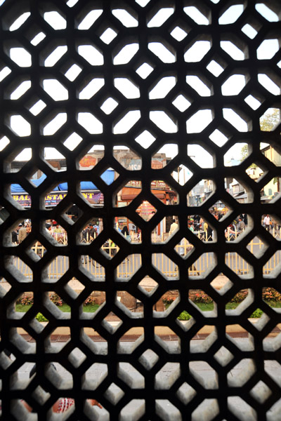 Looking through the stone lattice of the Charminar