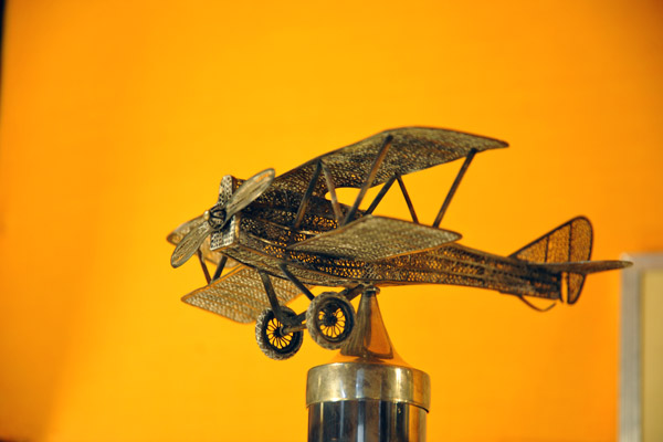 Silver filigree airplane