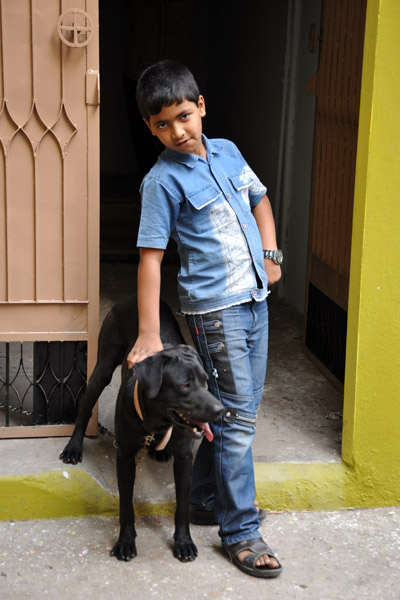 Boy with a black dog, Hyderabad