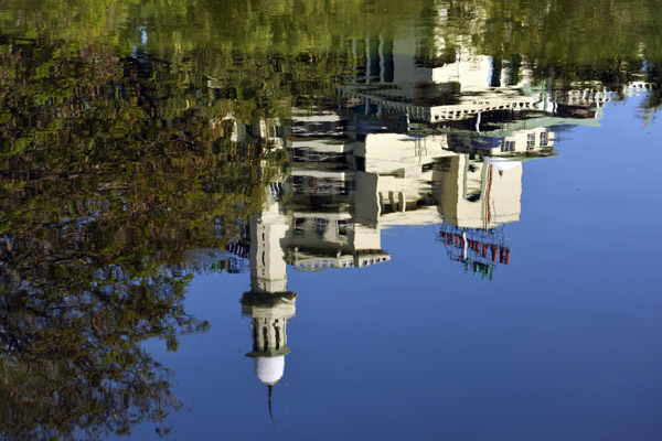 Reflection of the Haj House in the Public Gardens pond