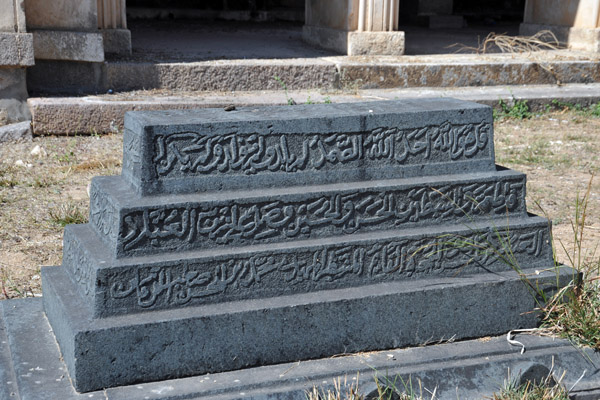 Grave among the mausoleums