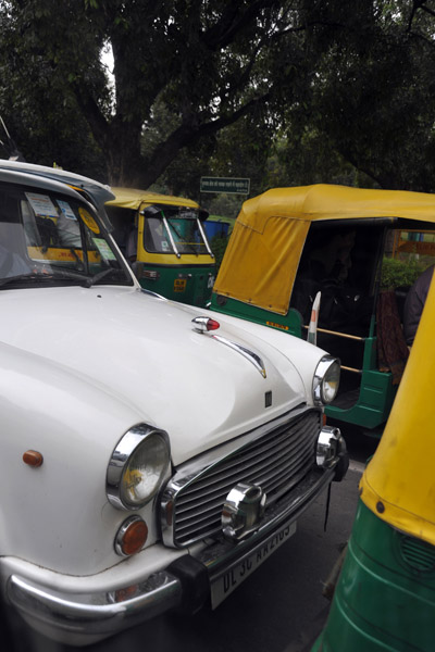 White Ambassador with New Delhi tuktuks