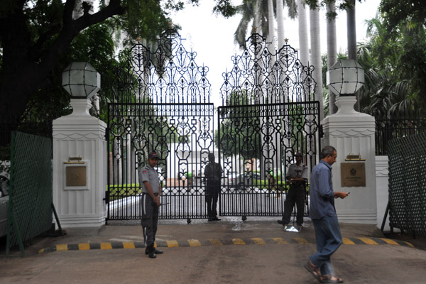 Gate to the Imperial Hotel, a remnant of the British Raj in New Delhi