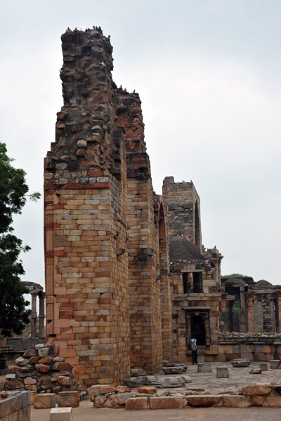 The Qutb Minar is surrounded by ruins