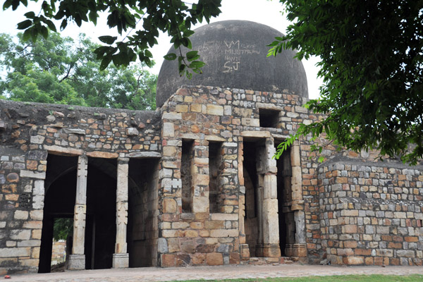 Part of the former madrasa at Qutub Minar with that looks like a modern dome