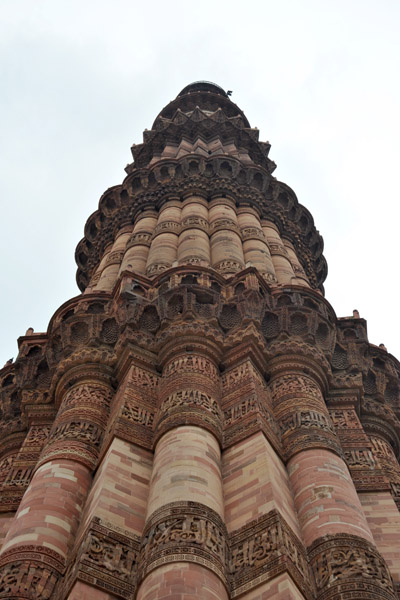 Standing at the base of the Qutub Minar