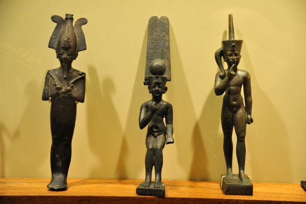 Osiris with two statuettes of Horus as a child