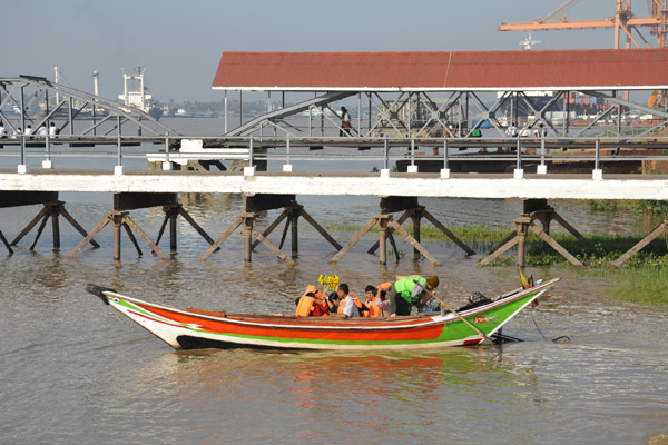 Foreigners aren't allowed to use boats like this to cross the Yangon River