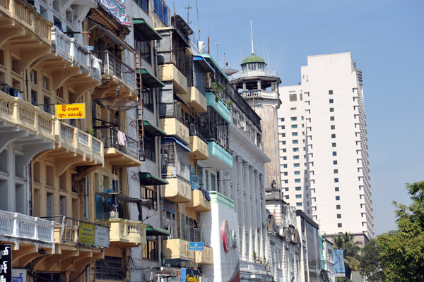 Traders Hotel rising above theold buildings of Sule Pagoda Road