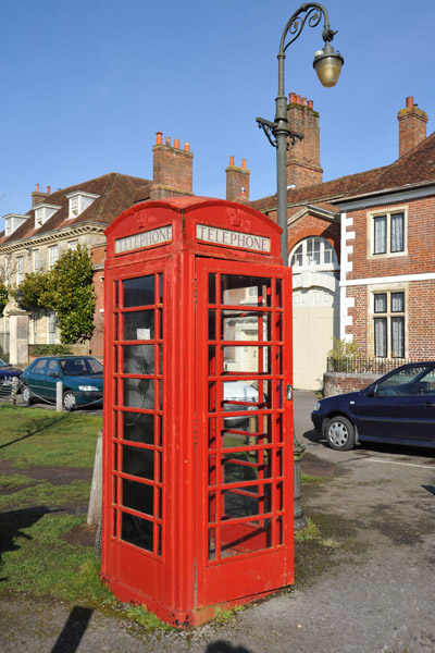 Old red British telephone booth