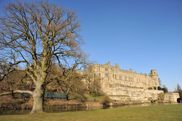 Warwick Castle from across the River Avon by the trebuchet