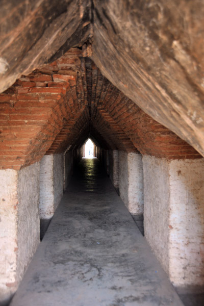 Stout brick pillars in the undercroft of Maha Aungmye Bonzan