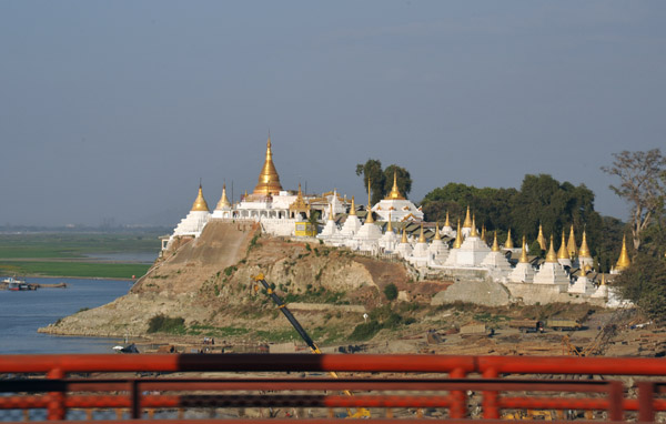 Monastery at a small cliff on the eastern side of the New Irrawaddy River Bridge