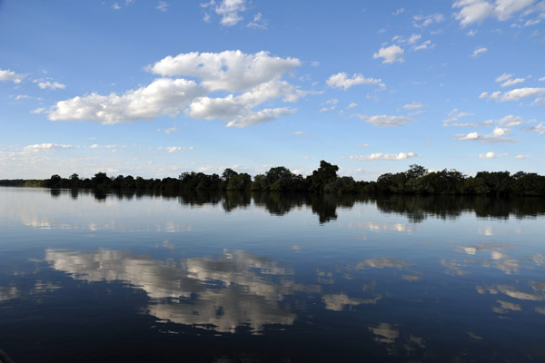 Clouds reflecting in the calm Kafue River