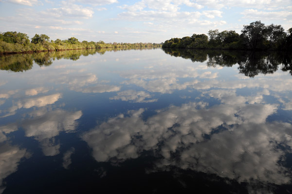 Kafue River by boat from McBride's Camp - cloud reflections