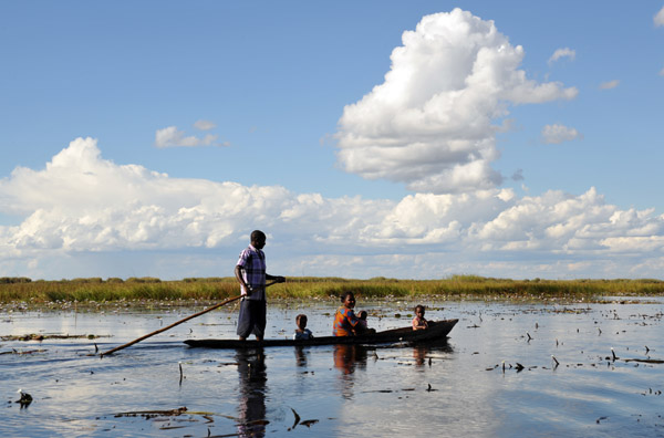A family of 5 in a mokoro, Bangweulu Swamps