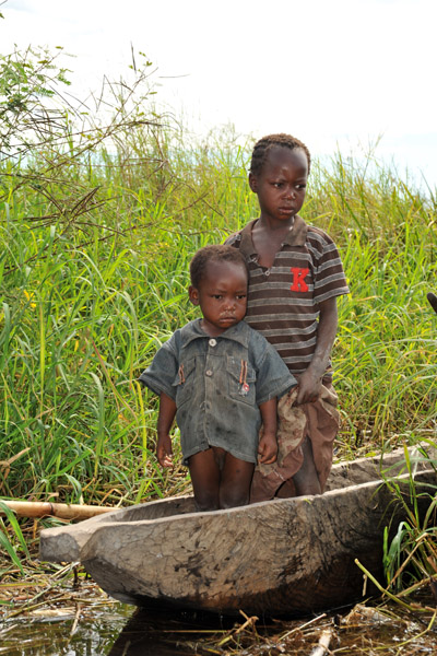 Boys in a mokoro, Bangweulu Swamps