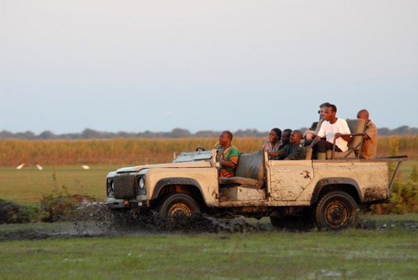 Land Rover fighting its way through the mud on the edge of the Bangweulu Swamps