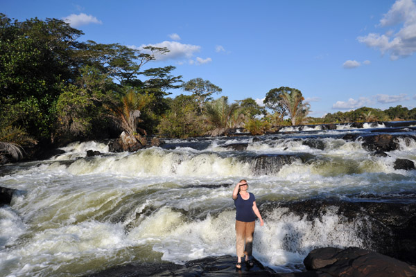 Stephanie posing with Chusa Falls, Mansha River