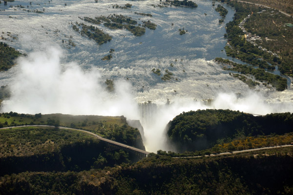 Victoria Falls and the bridge linking Zimbabwe (left) with Zambia (right)